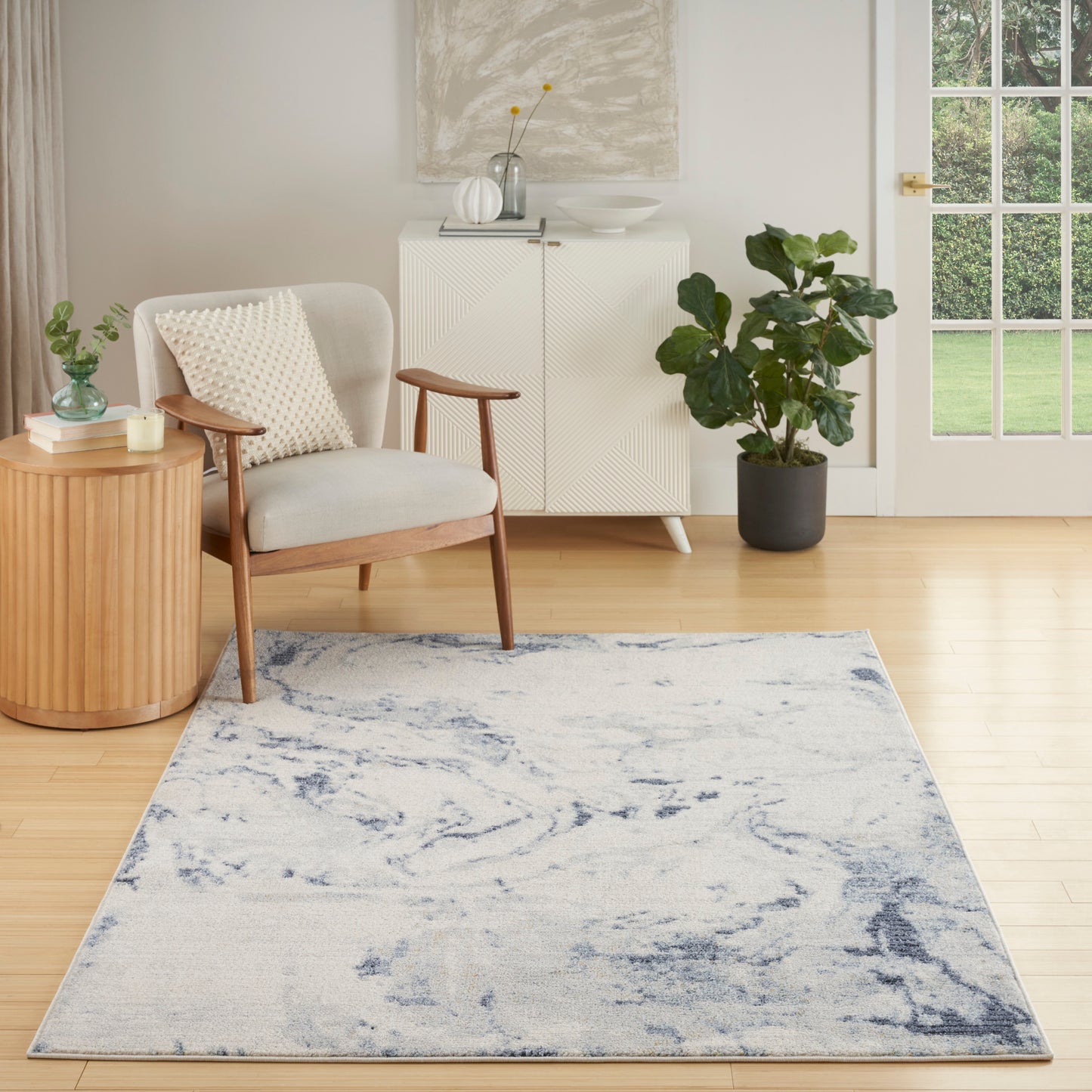 Nourison Motion 5'3" x 7' Ivory Blue Modern Indoor Rug