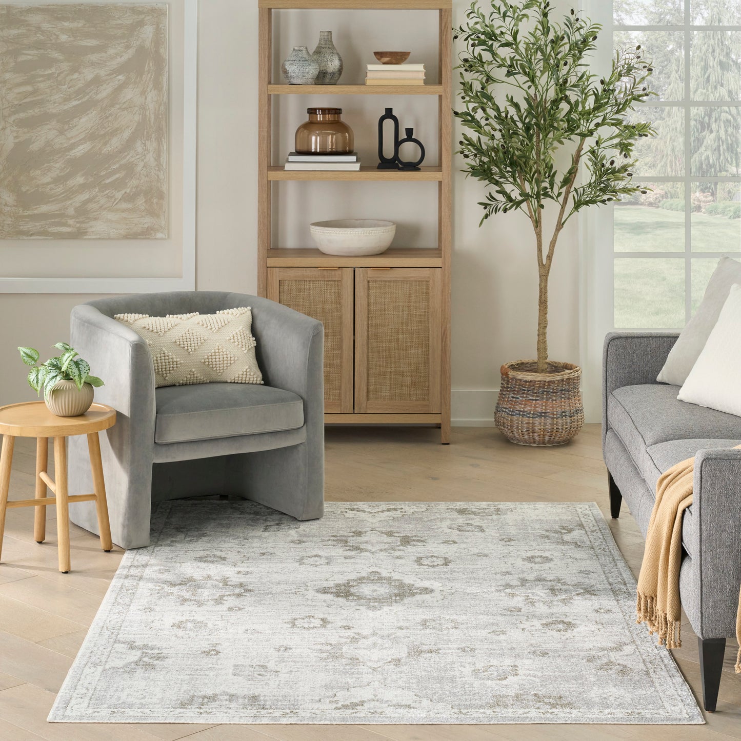 Nourison Astra Machine Washable 6'7" x 9' Ivory Vintage Indoor Rug