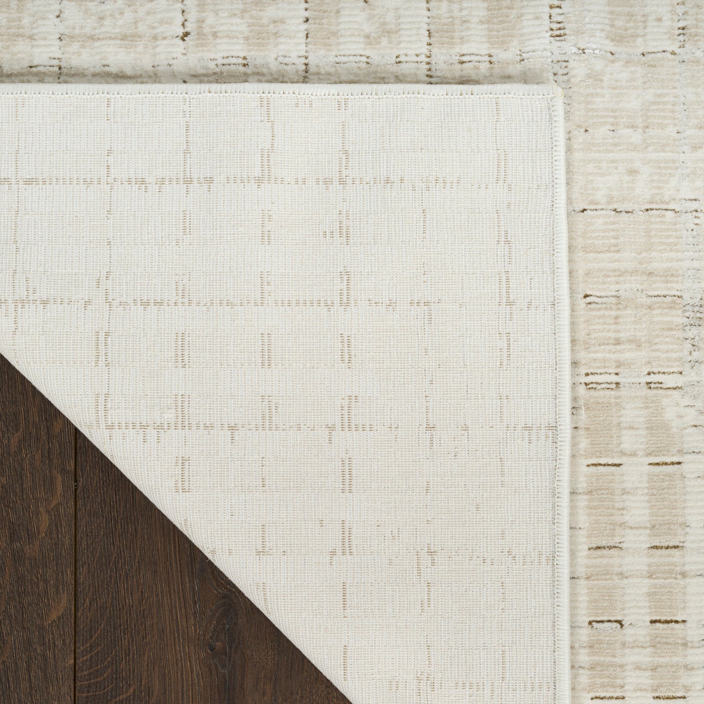 DKNY Grand Street 9' x 12' Ivory Beige Modern Indoor Rug