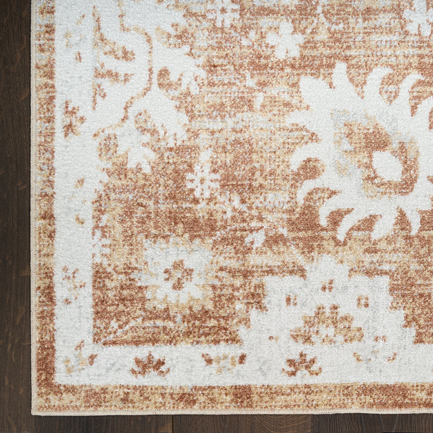 Nourison Astra Machine Washable 5'3" x 7' Copper Vintage Indoor Rug