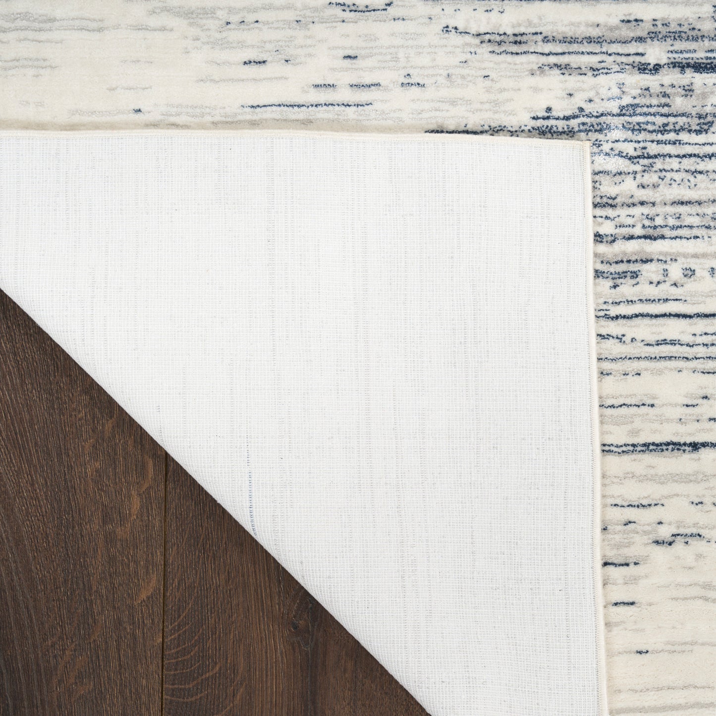 DKNY Grand Street 7'10" x 9'10" Ivory Blue Modern Indoor Rug