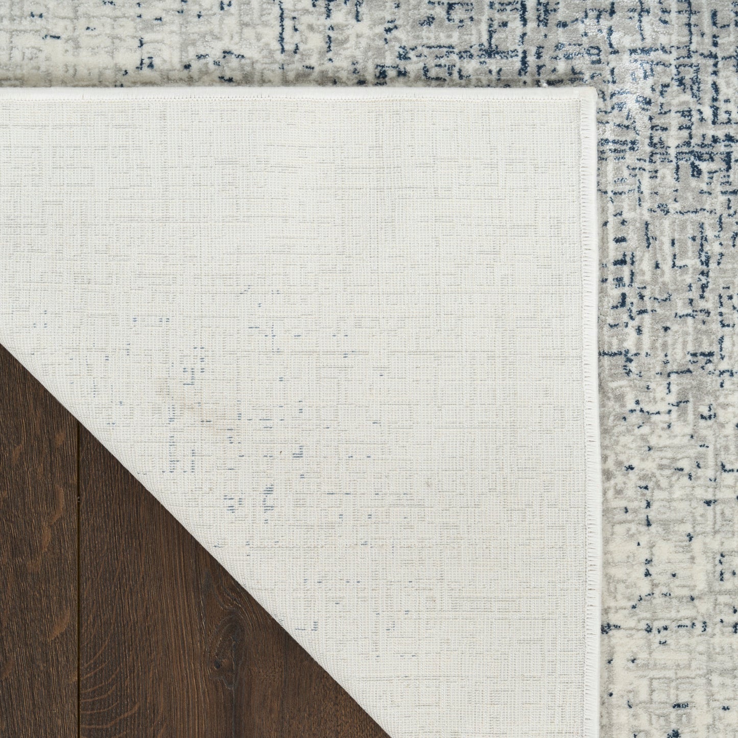 DKNY Grand Street 9' x 12' Ivory Blue Modern Indoor Rug