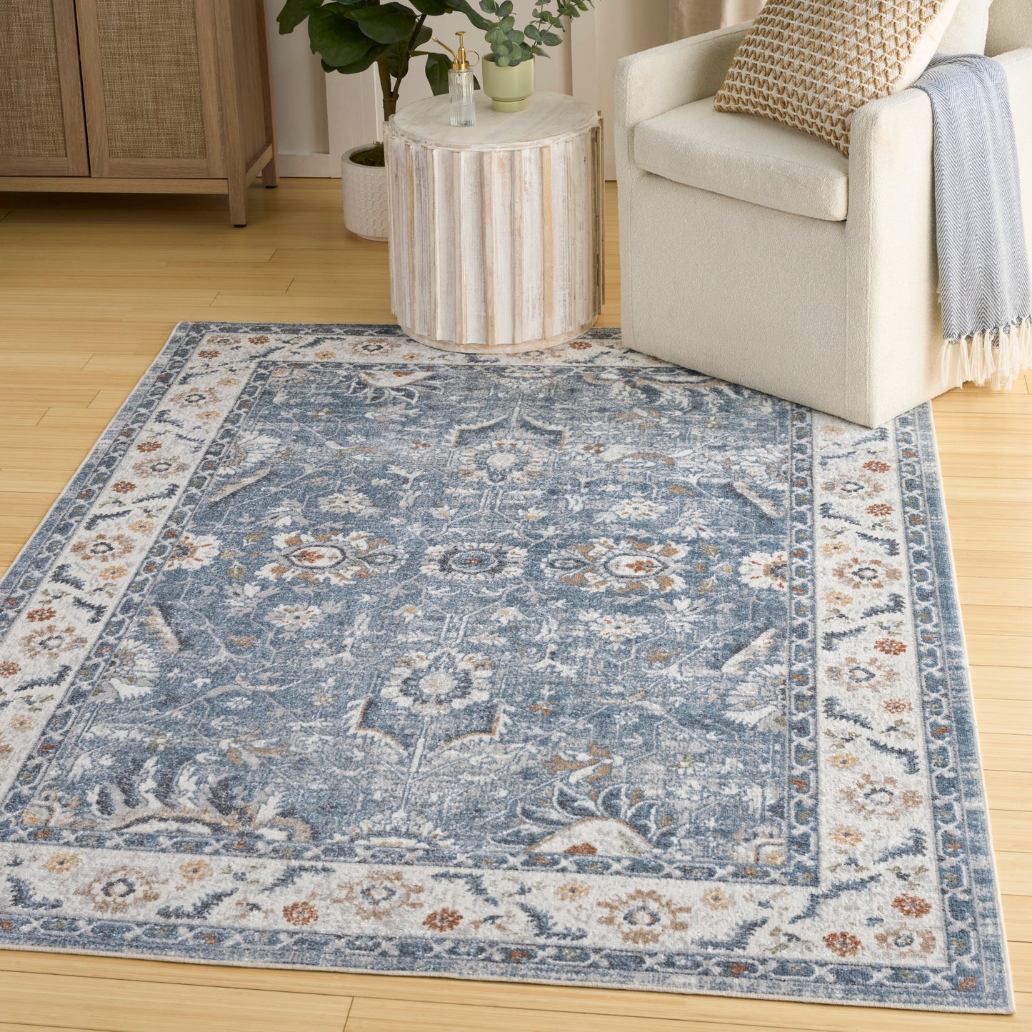 Nourison Astra Machine Washable 6'7" x 9' Blue Vintage Indoor Rug