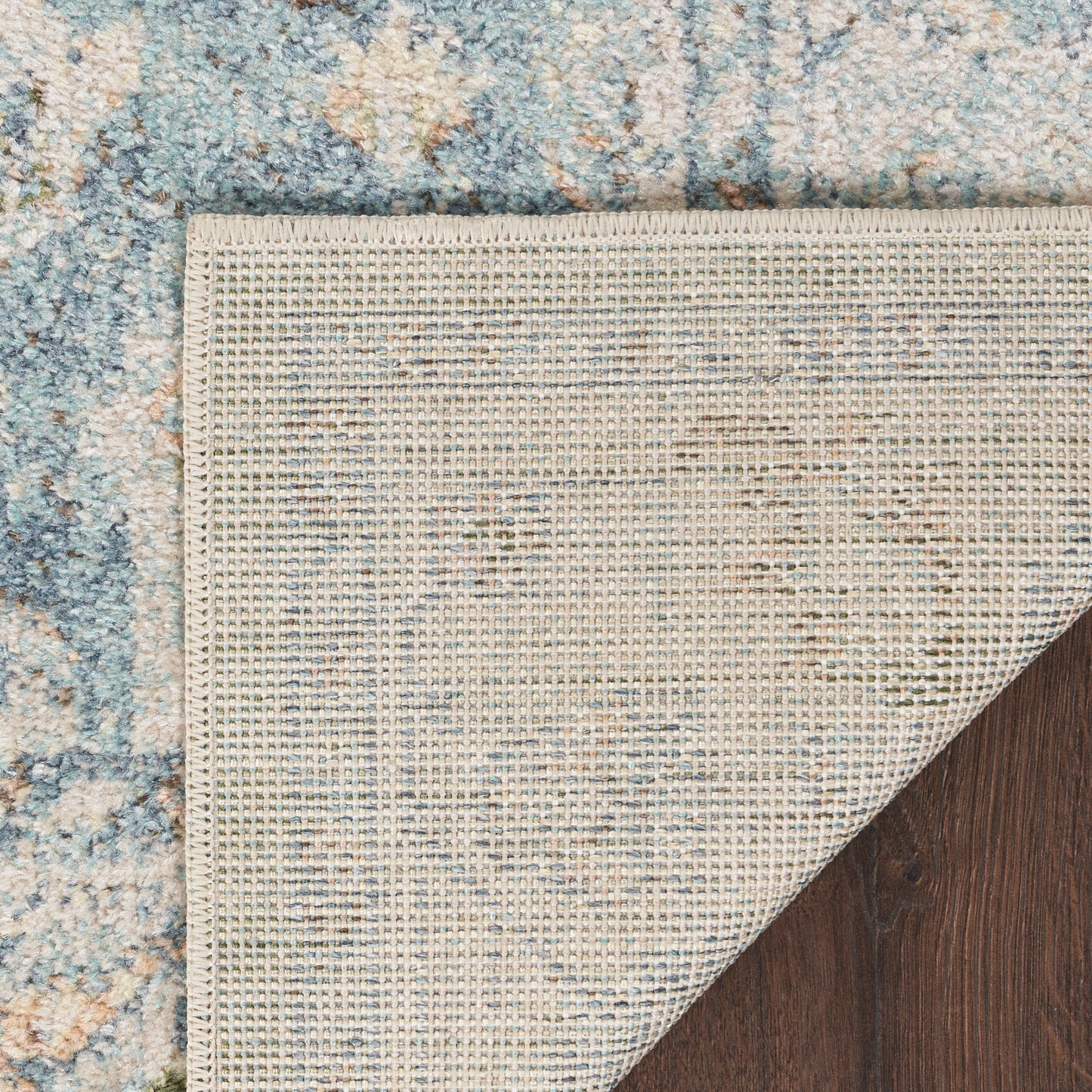 Nourison Astra Machine Washable 6'7" x 9' Light Blue Vintage Indoor Rug