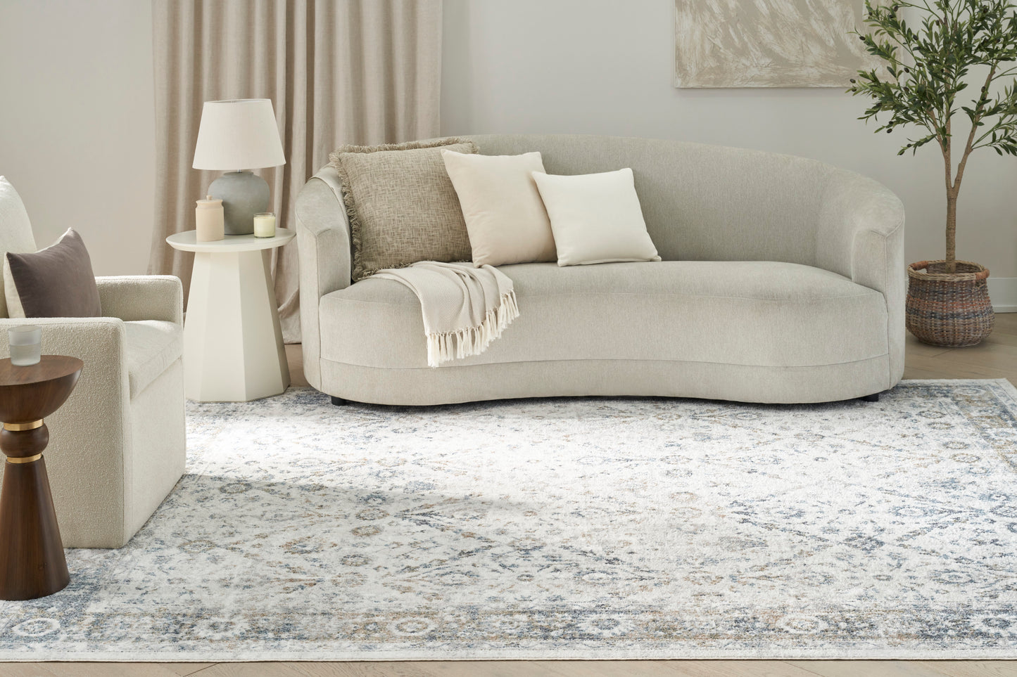 Nourison Astra Machine Washable 6'7" x 9' Ivory Blue Vintage Indoor Rug