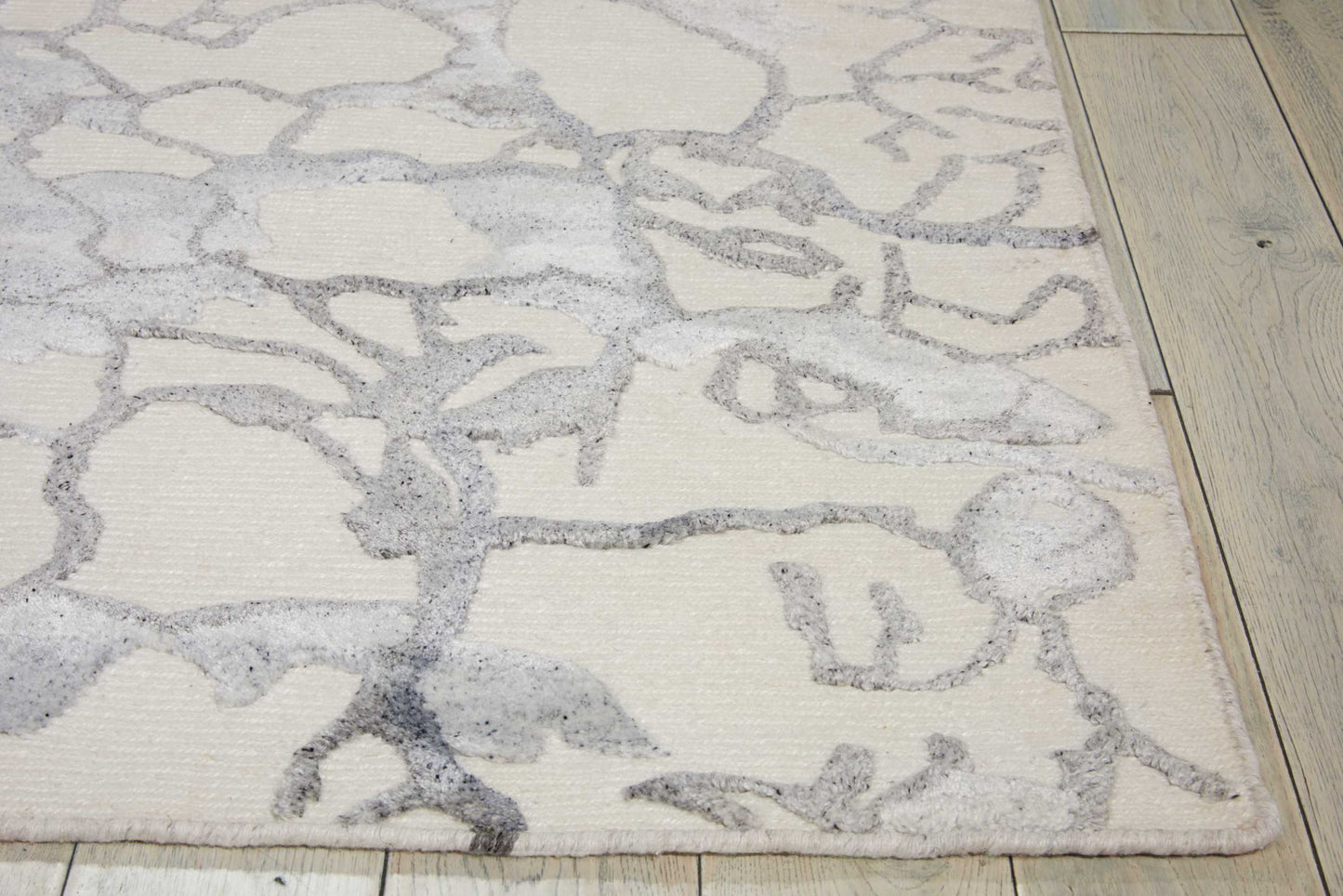 Nourison Divine 9'9" x 13'9" Ivory Modern Indoor Rug