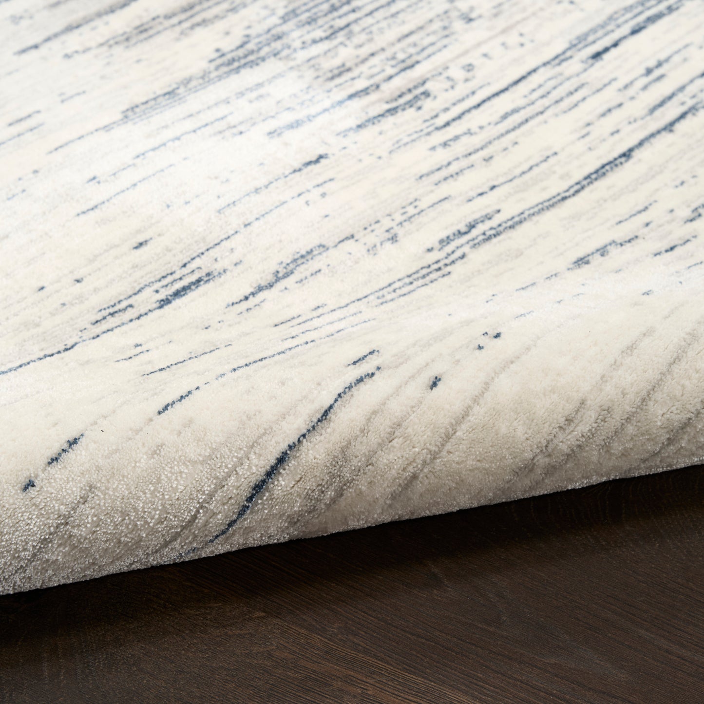 DKNY Grand Street 7'10" x 9'10" Ivory Blue Modern Indoor Rug