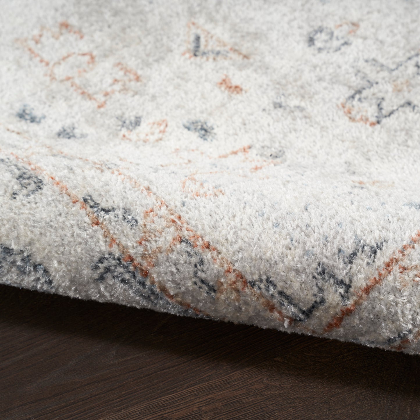 Nourison Astra Machine Washable 6'7" x 9' Light Blue Vintage Indoor Rug