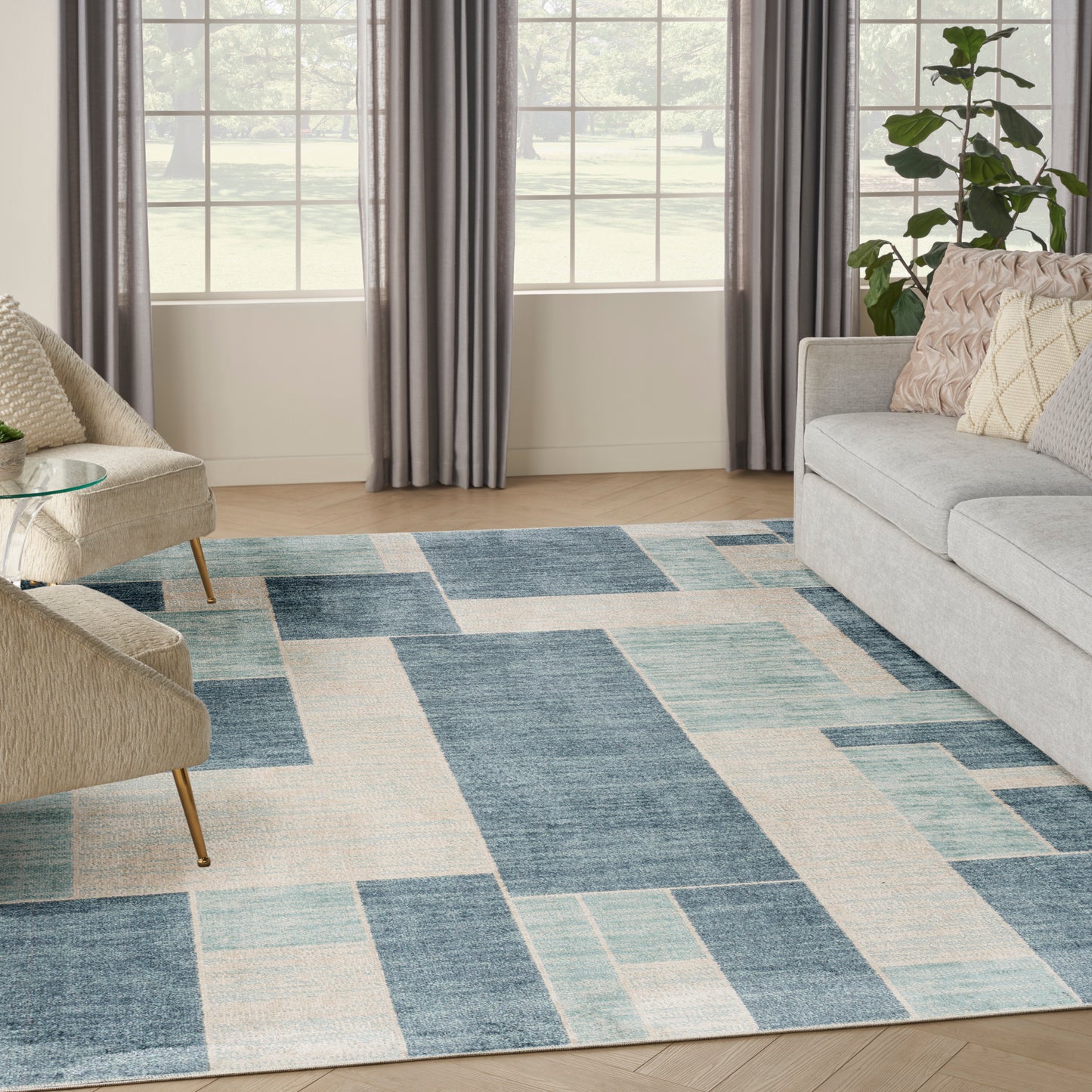 Nourison Astra Machine Washable 7'10" x 10' Blue Ivory Modern Indoor Rug