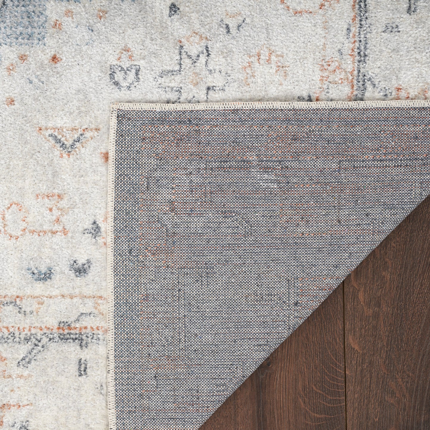 Nourison Astra Machine Washable 6'7" x 9' Light Blue Vintage Indoor Rug