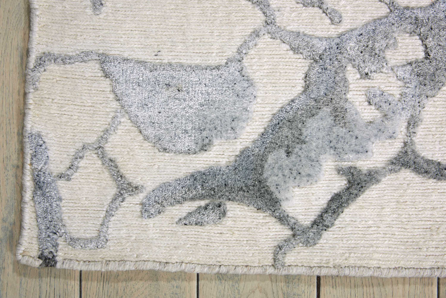 Nourison Divine 9'9" x 13'9" Ivory Modern Indoor Rug