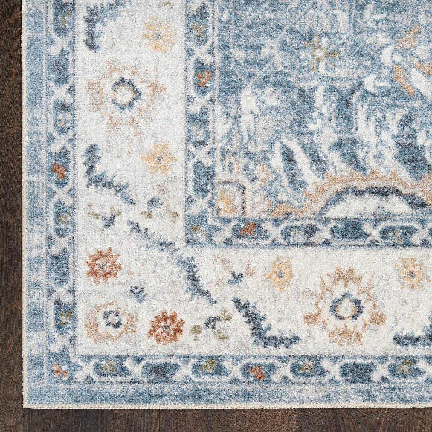 Nourison Astra Machine Washable 6'7" x 9' Blue Vintage Indoor Rug