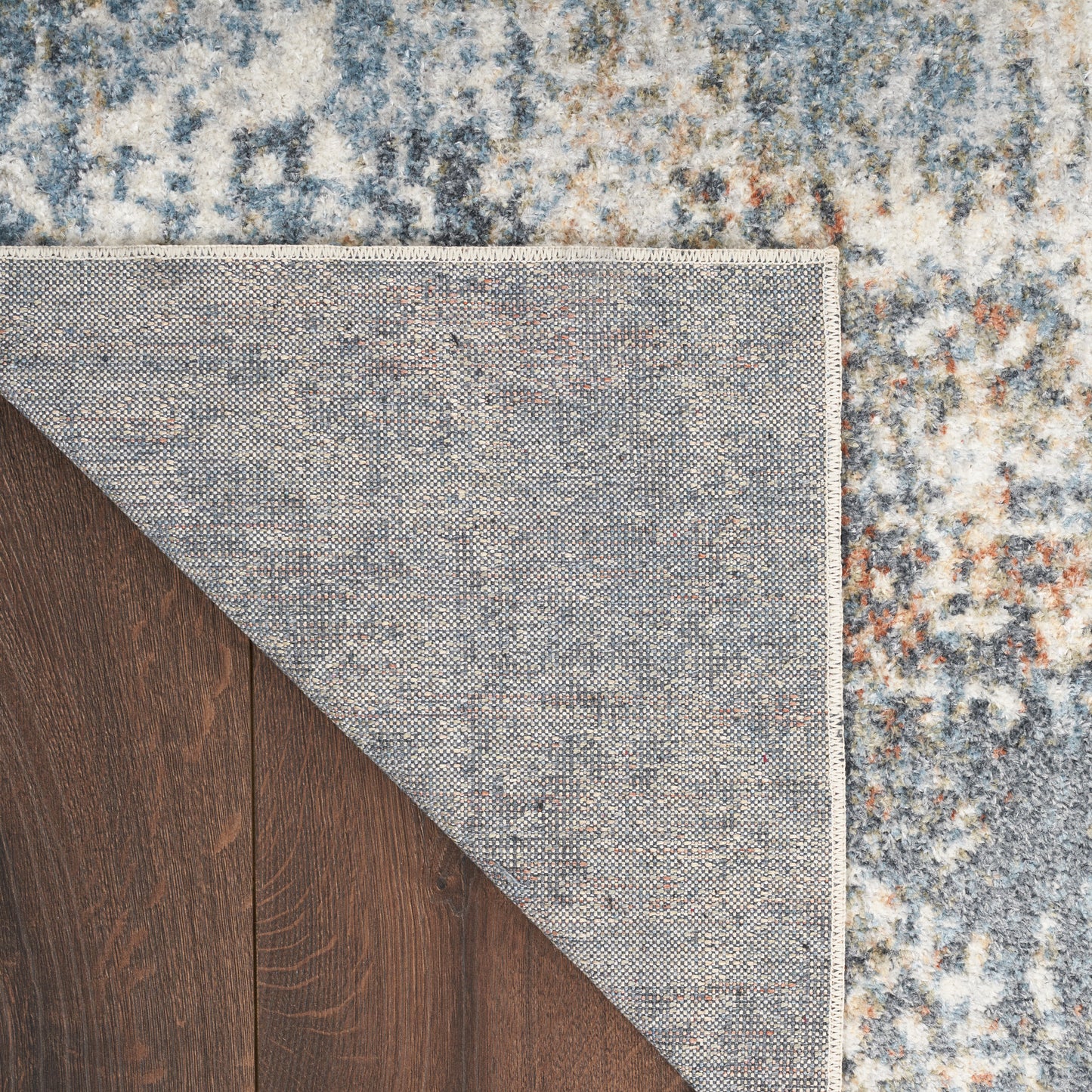 Nourison Astra Machine Washable 5'3" x 7' Multicolor Modern Indoor Rug